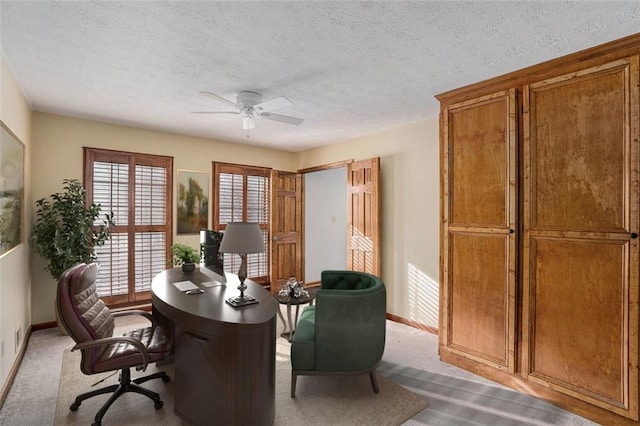 1791 Lake George Dr, Lithia Springs, GA 30122 - carpeted office space with ceiling fan, baseboards, and a textured ceiling