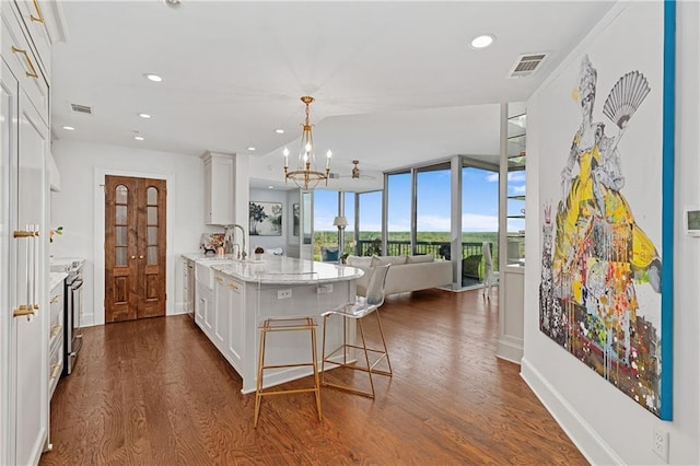 kitchen featuring recessed lighting, visible vents, white cabinetry, and dark wood-type flooring