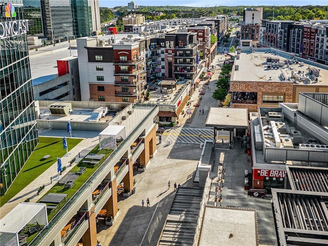 drone / aerial view featuring a city view