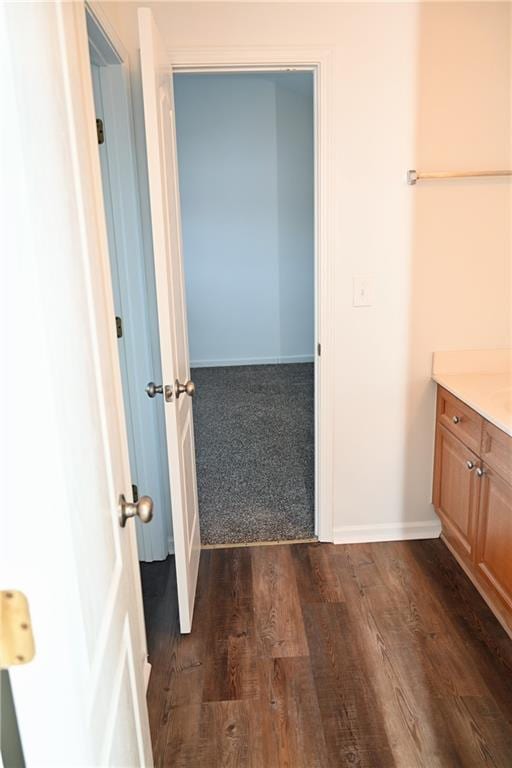 bathroom with vanity and hardwood / wood-style floors