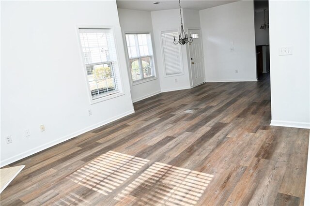 stairs featuring ceiling fan and hardwood / wood-style floors