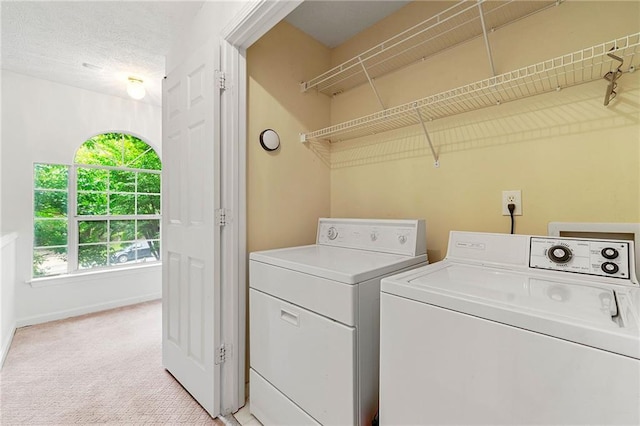 3040 Majestic Park Ct, Duluth, GA 30096 - laundry room featuring washing machine and dryer, light colored carpet, and baseboards