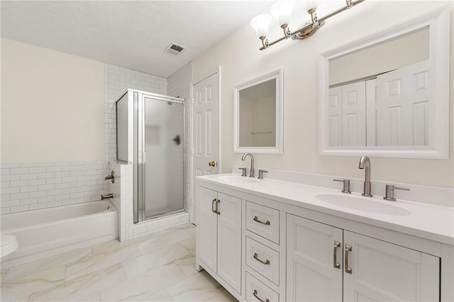 3040 Majestic Park Ct, Duluth, GA 30096 - full bathroom featuring double vanity, a stall shower, a garden tub, marble look tile flooring, and a textured ceiling