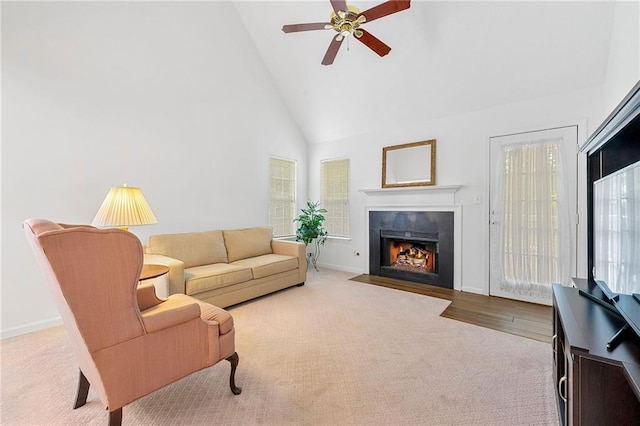 3040 Majestic Park Ct, Duluth, GA 30096 - living area featuring carpet flooring, high vaulted ceiling, a fireplace with flush hearth, a ceiling fan, and baseboards