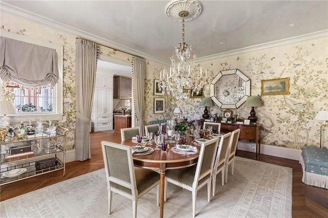 dining room featuring an inviting chandelier, ornamental molding, and parquet floors