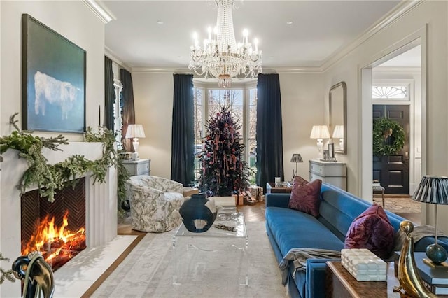 sitting room with a notable chandelier, crown molding, and a high end fireplace