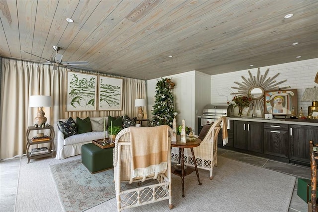 interior space with wooden ceiling and ceiling fan