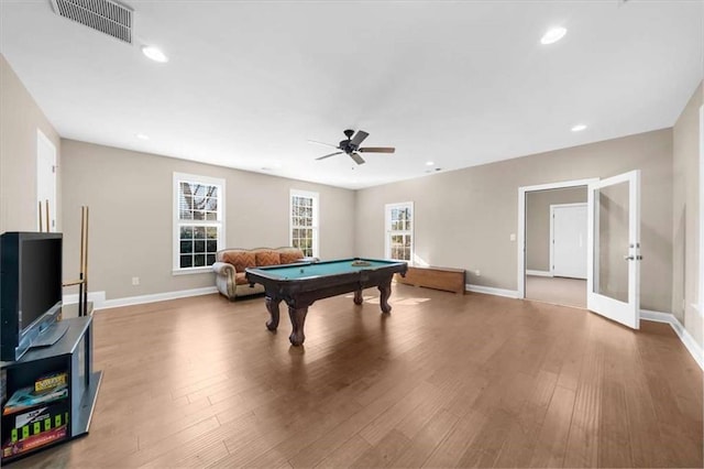 rec room with hardwood / wood-style flooring, ceiling fan, pool table, and french doors