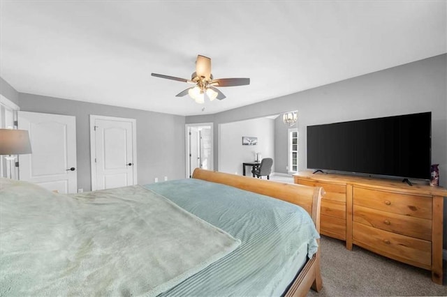 carpeted bedroom featuring ceiling fan