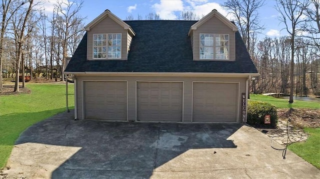 garage with a yard