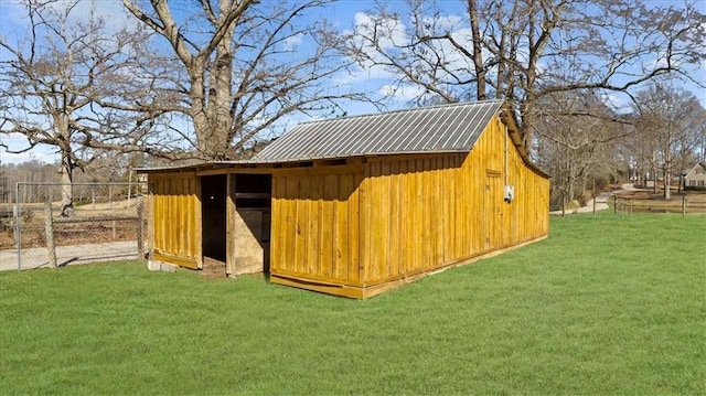 view of outdoor structure with a yard