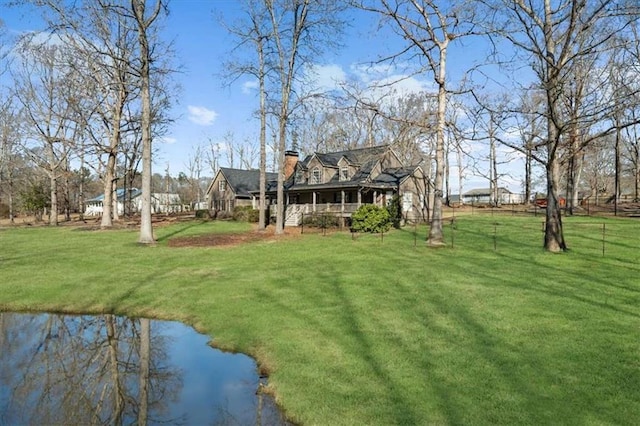 view of yard featuring a water view