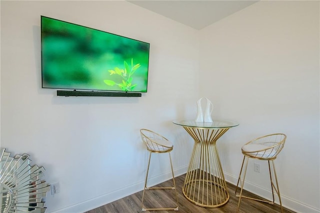 details with wood finished floors and baseboards