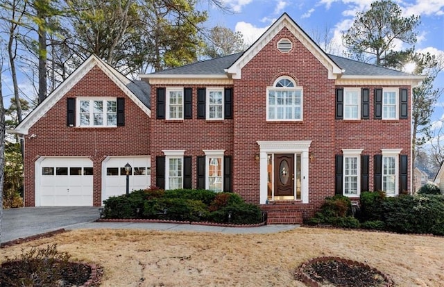 colonial home with a garage