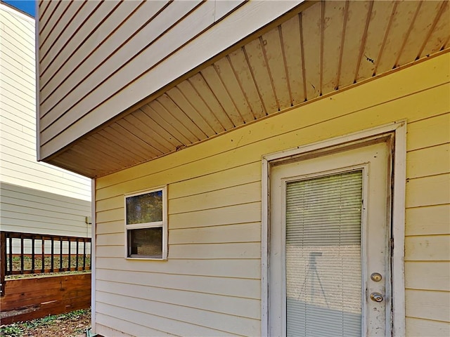 exterior details with wooden walls and wooden ceiling