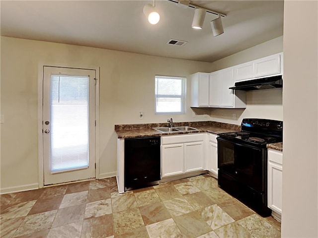 kitchen with rail lighting, black appliances, sink, and white cabinets