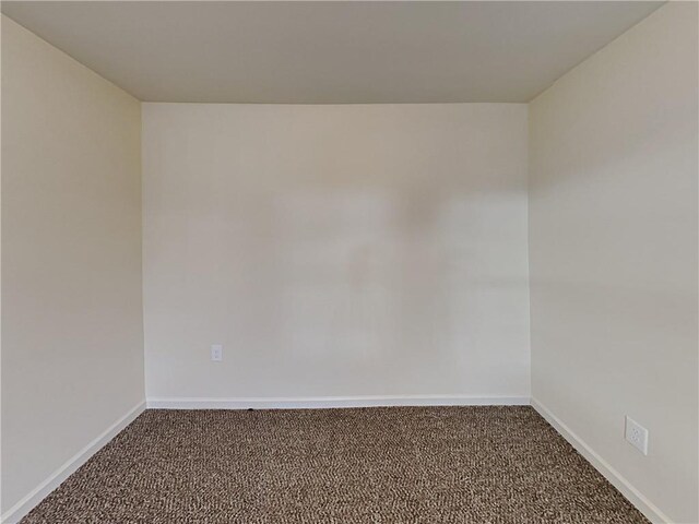 empty room featuring carpet