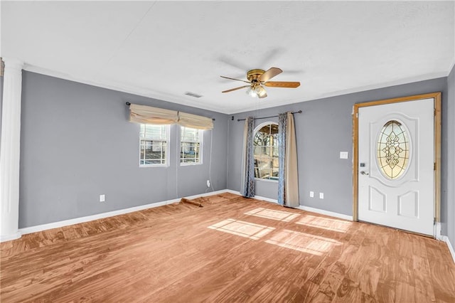 entryway with ceiling fan and light wood-type flooring