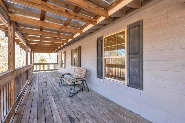 wooden terrace featuring a porch