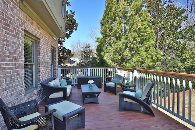 wooden deck featuring an outdoor living space