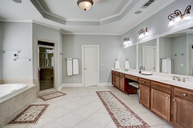 full bath featuring visible vents, a stall shower, a sink, tile patterned flooring, and a raised ceiling