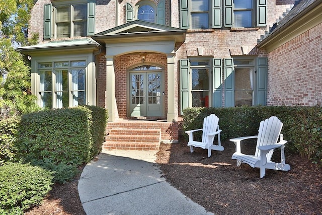 entrance to property with french doors and brick siding