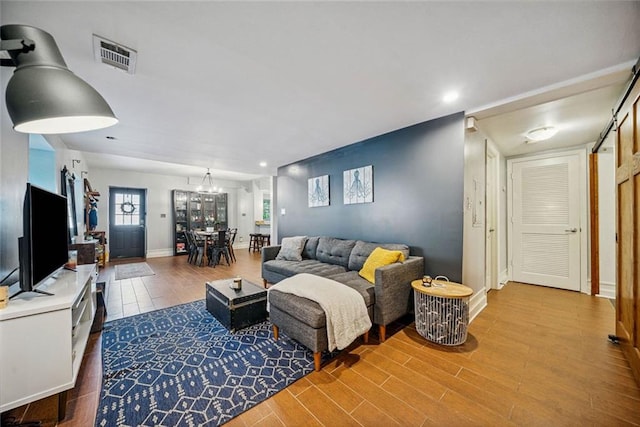 3048 Briarcliff Rd NE Unit 9, Atlanta, GA 30329 - living room featuring recessed lighting and wood finished floors