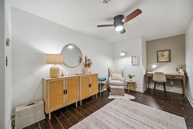 3048 Briarcliff Rd NE Unit 9, Atlanta, GA 30329 - living area with dark wood finished floors, a ceiling fan, and a desk