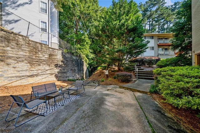 3048 Briarcliff Rd NE Unit 9, Atlanta, GA 30329 - view of patio / terrace featuring stairs