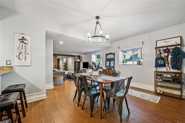3048 Briarcliff Rd NE Unit 9, Atlanta, GA 30329 - dining space featuring wood finished floors and a chandelier