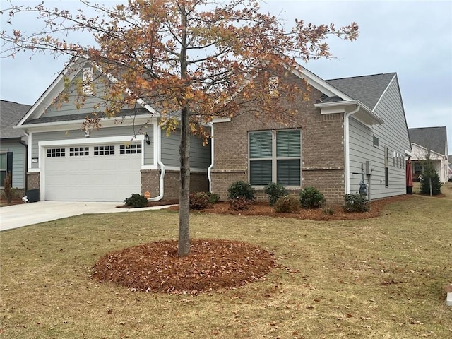 craftsman inspired home featuring driveway, brick siding, a garage, and a front yard