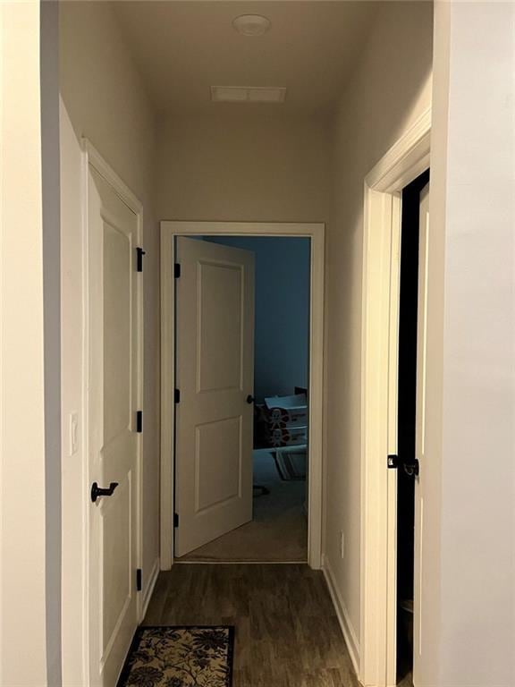 hallway featuring wood finished floors