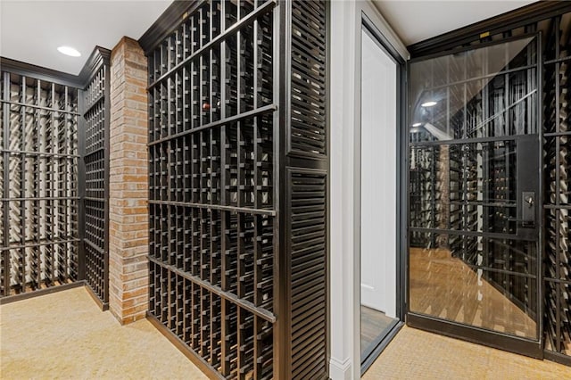 wine room with recessed lighting and carpet