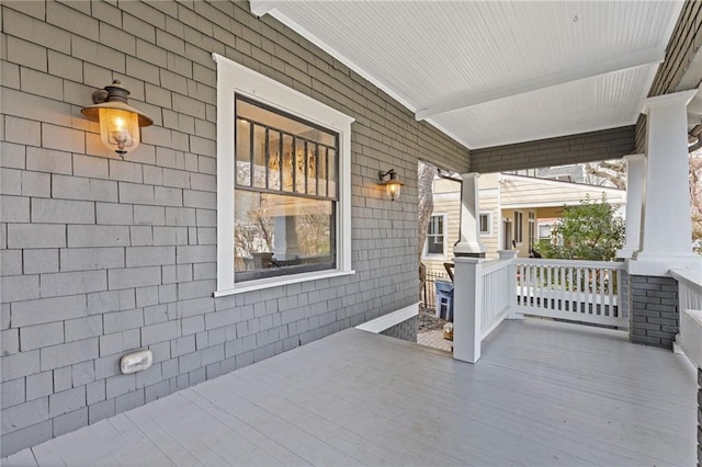 view of patio featuring a porch