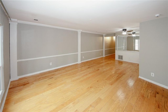 485 Sherman Way, Decatur, GA 30033 - empty room with light wood-style floors, a smoke detector, baseboards, a ceiling fan, and crown molding