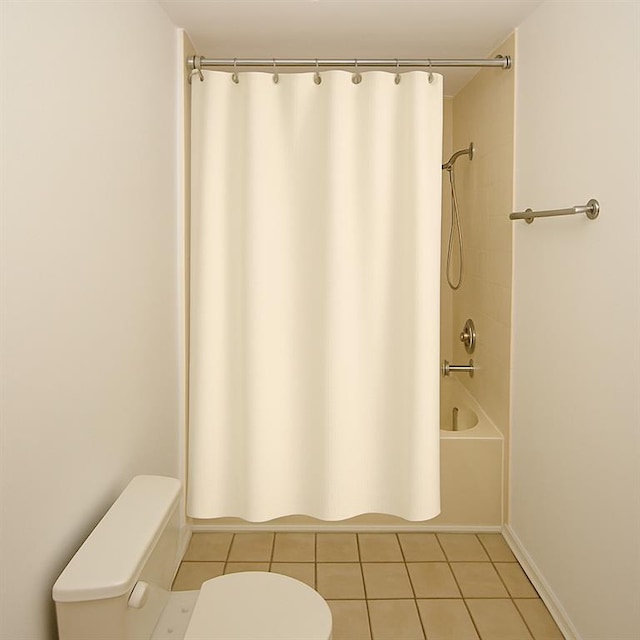 485 Sherman Way, Decatur, GA 30033 - bathroom featuring toilet, tile patterned floors, and shower / tub combo