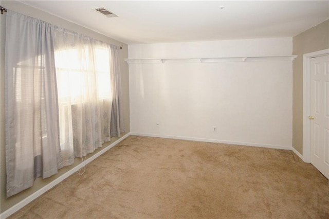 485 Sherman Way, Decatur, GA 30033 - empty room featuring light carpet and baseboards
