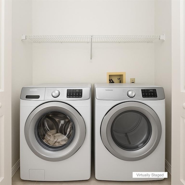 485 Sherman Way, Decatur, GA 30033 - laundry area with washer and clothes dryer and baseboards