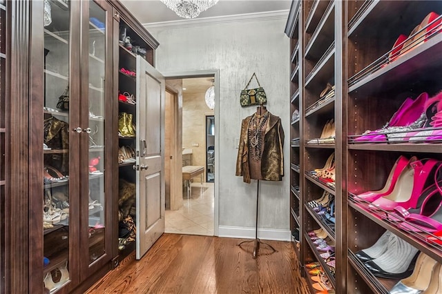 538 Sarabrook Pl NE, Sandy Springs, GA 30342 - spacious closet with wood finished floors and a chandelier