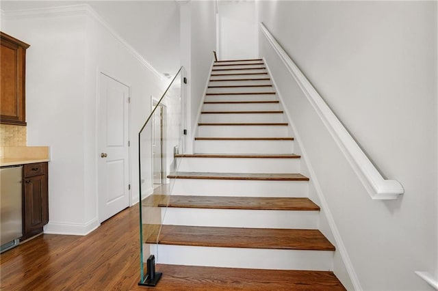 538 Sarabrook Pl NE, Sandy Springs, GA 30342 - stairs featuring wood finished floors and baseboards