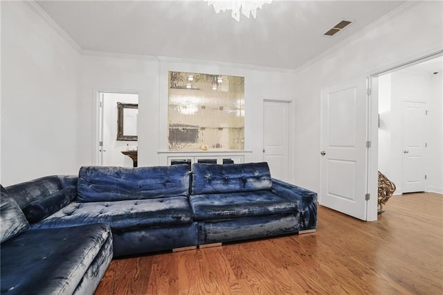 538 Sarabrook Pl NE, Sandy Springs, GA 30342 - living room featuring wood finished floors and crown molding