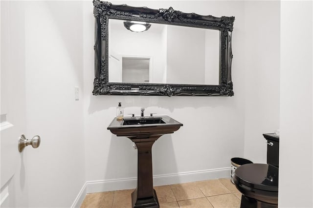 538 Sarabrook Pl NE, Sandy Springs, GA 30342 - bathroom featuring toilet, tile patterned floors, and baseboards