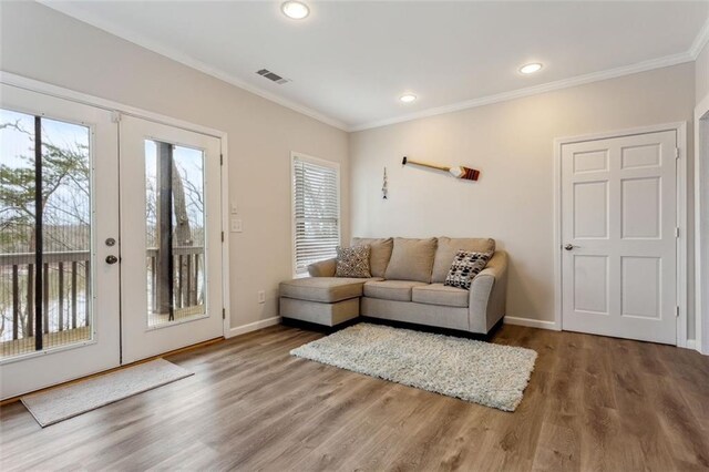 2600 Ramsey Rd, Gainesville, GA 30501 - living room with hardwood / wood-style flooring, crown molding, and french doors
