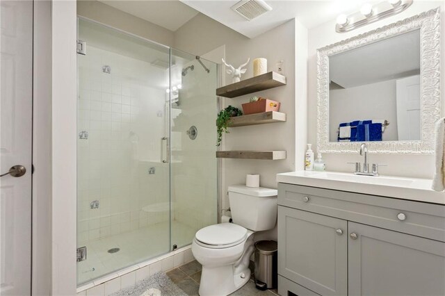 2600 Ramsey Rd, Gainesville, GA 30501 - bathroom featuring vanity, toilet, and an enclosed shower