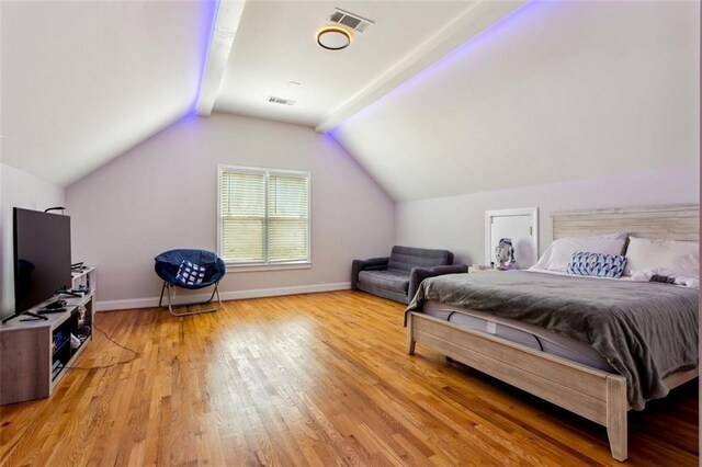 2600 Ramsey Rd, Gainesville, GA 30501 - bedroom featuring hardwood / wood-style flooring and vaulted ceiling with beams