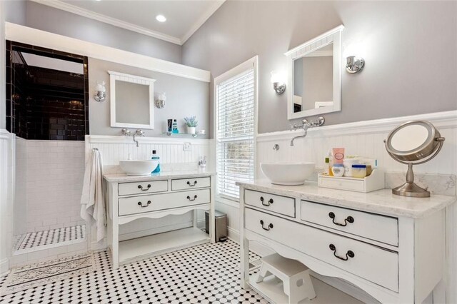 2600 Ramsey Rd, Gainesville, GA 30501 - bathroom featuring crown molding, vanity, and a wealth of natural light