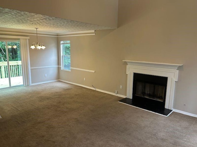 4963 Windsor Downs Ln, Decatur, GA 30035 - unfurnished living room with carpet, a chandelier, baseboards, a fireplace with raised hearth, and ornamental molding