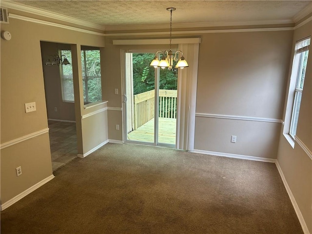 4963 Windsor Downs Ln, Decatur, GA 30035 - unfurnished dining area featuring a chandelier, carpet, baseboards, crown molding, and a textured ceiling