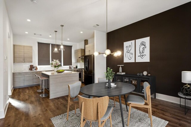 dining room featuring dark hardwood / wood-style floors