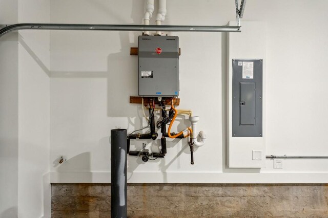 utilities featuring electric panel and tankless water heater